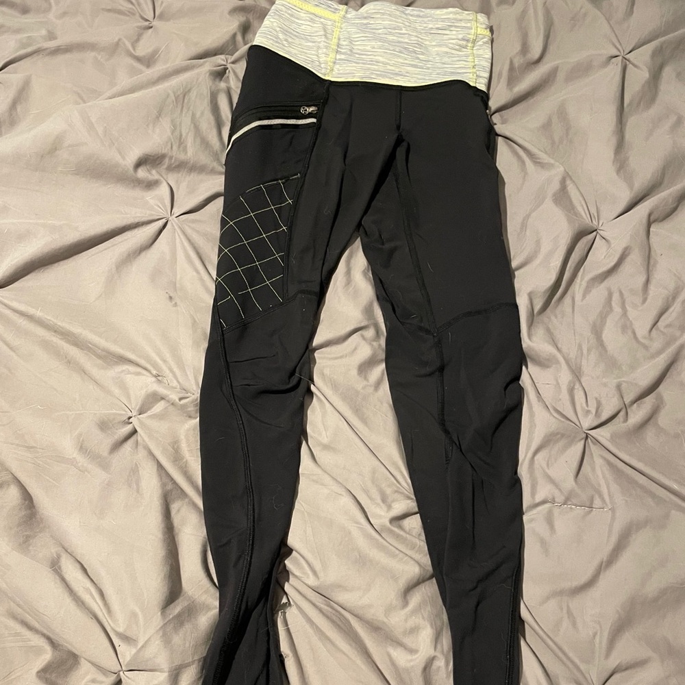 Black Lululemon Leggings with Yellow Stitching